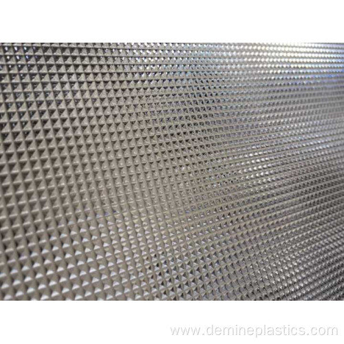 Light diffusing prismatic sheet for advertising